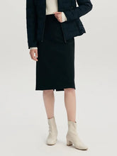 a woman in black skirt